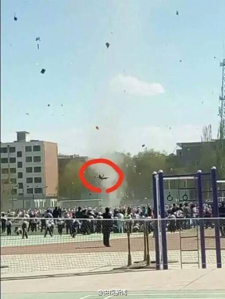 Dust devil lifts child high in the air