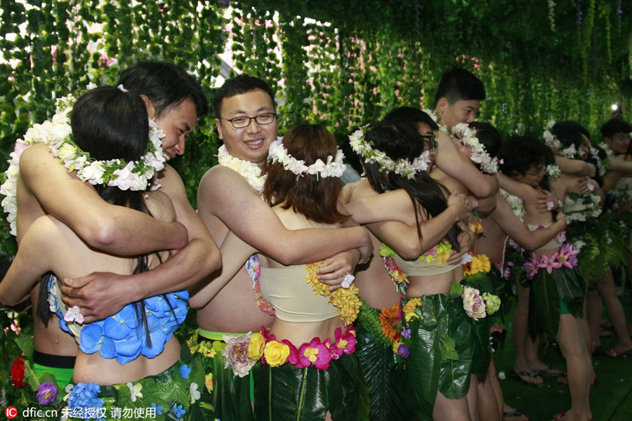 Couples get married in their 'birthday suit'