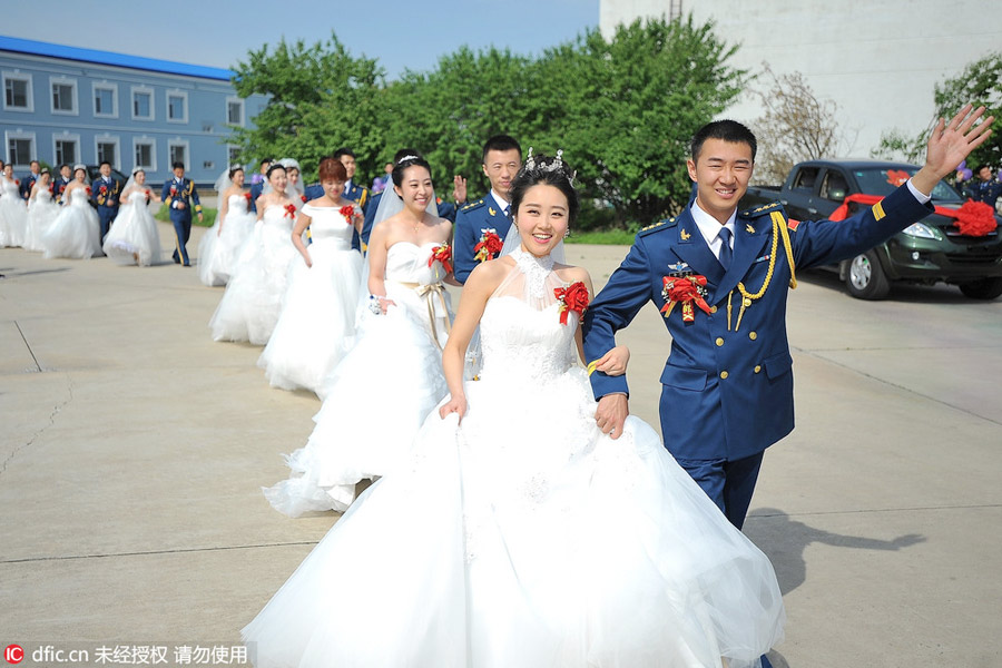Military-style wedding: Fighter jets, grooms in dashing uniforms