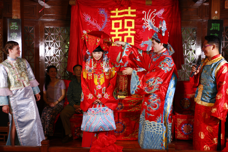 American marries Chinese girl in traditional wedding
