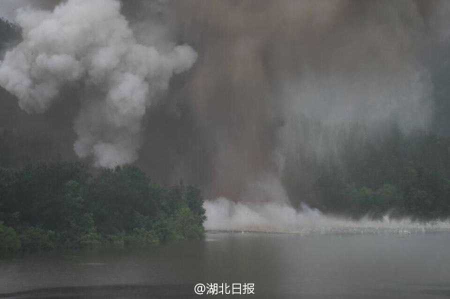Dam's floodway blasted to discharge water in Hubei province