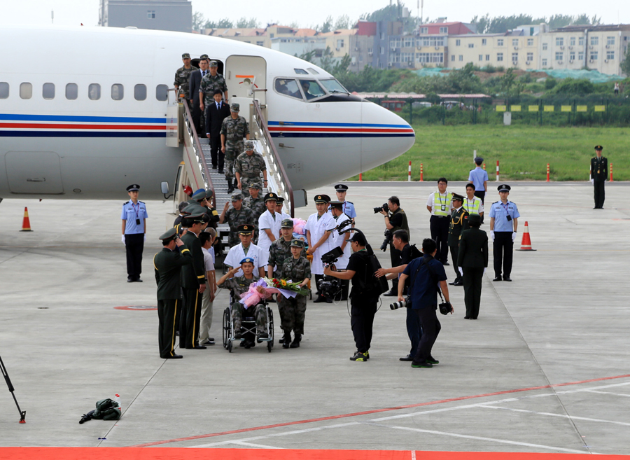 Remains of two Chinese UN peacekeepers arrive in China