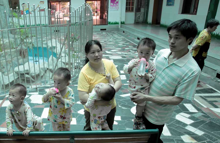 Four of a kind: Quadruplets get ready for school in Changsha