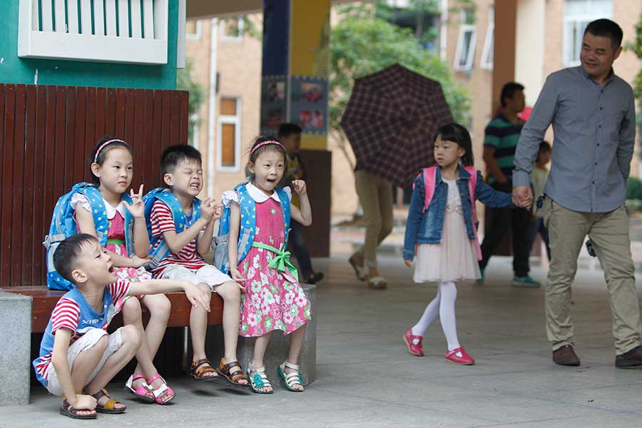 Four of a kind: Quadruplets get ready for school in Changsha