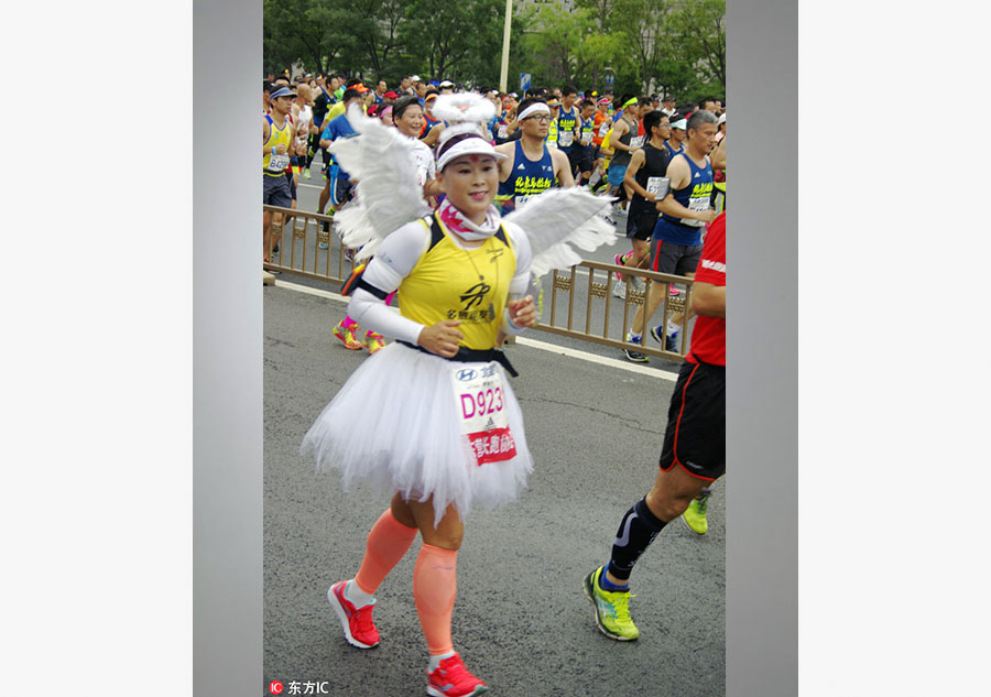 Runners compete during Beijing marathon