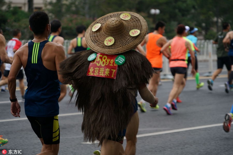 Runners compete during Beijing marathon