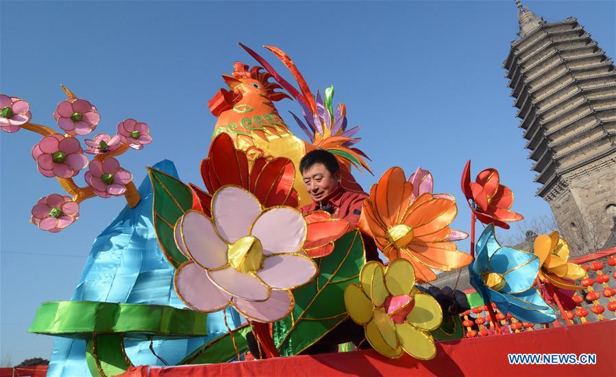 People across China greet upcoming Spring Festival