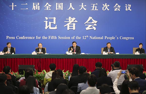 China's top economic planner holds press conference