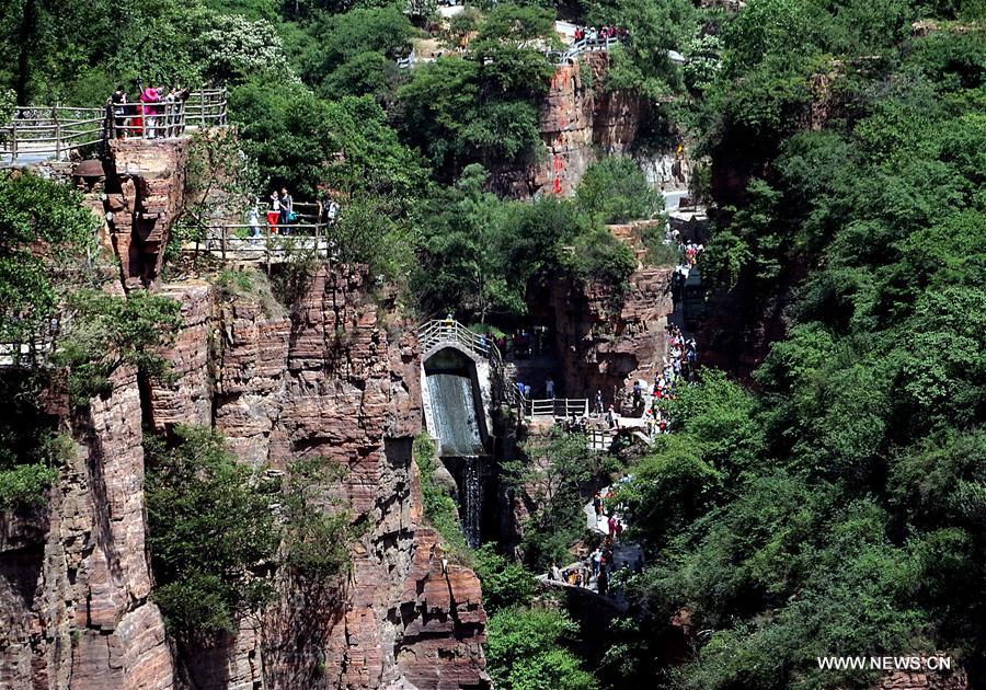 In pics: Miraculous road at Guoliang cliff corridor in Henan