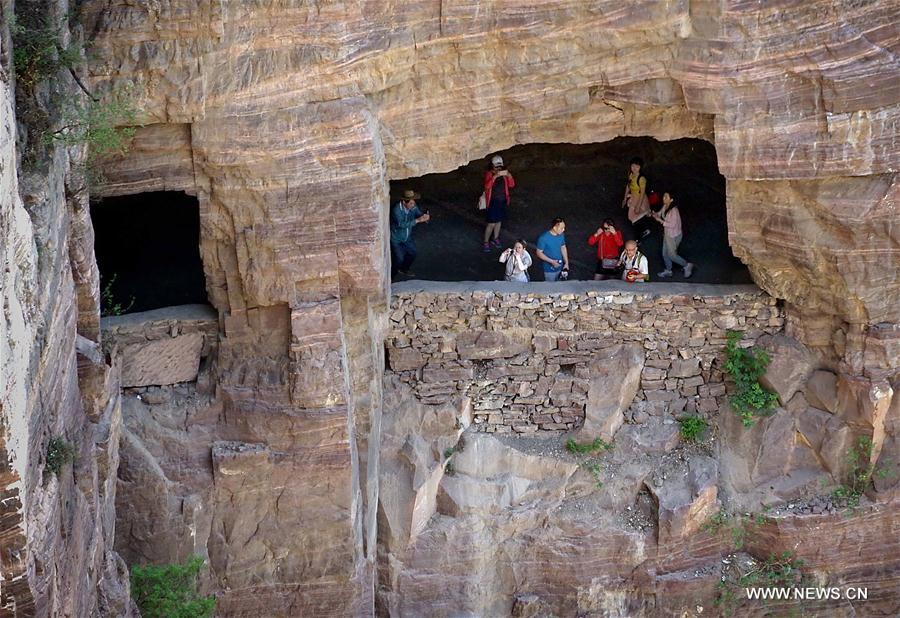 In pics: Miraculous road at Guoliang cliff corridor in Henan