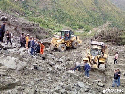 Over 100 buried in SW China landslide