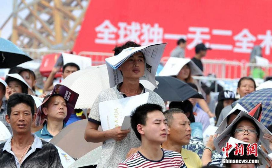 Anything goes as a hat in China's hot summers