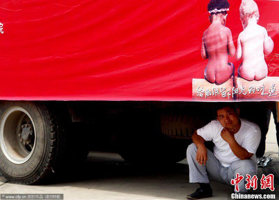 Anything goes as a hat in China's hot summers