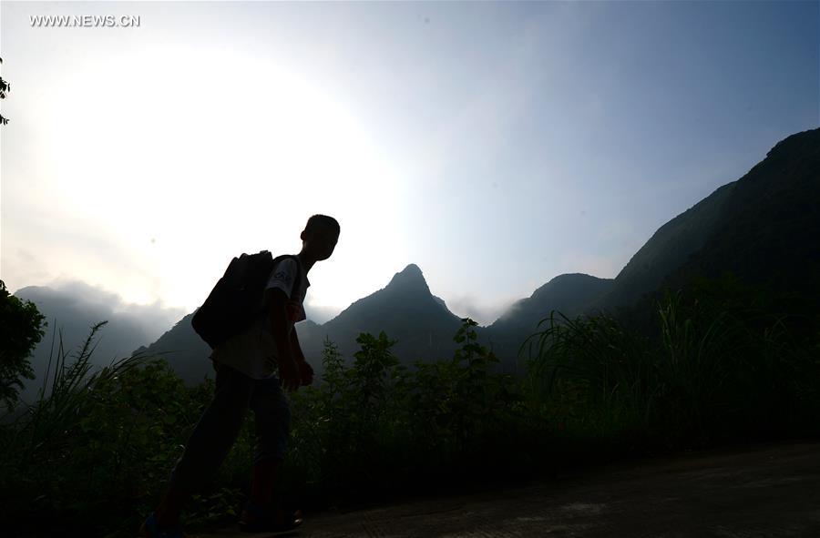 Mountains can't stop boy's dream of going to school