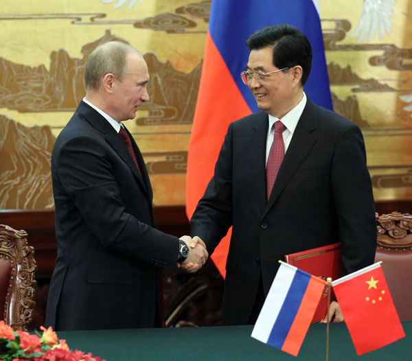 Hu, Putin pledge to boost China-Russia ties