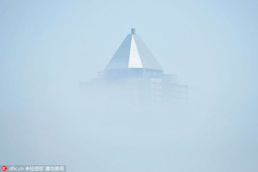 Rising above the clouds: Mist envelops Qingdao