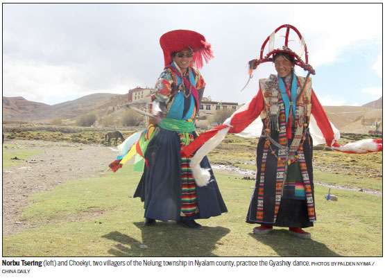Tibetan dancers strive to keep 'victory song' tradition alive