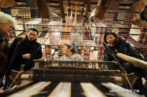 Folk artworks, handicrafts exhibited in Beijing