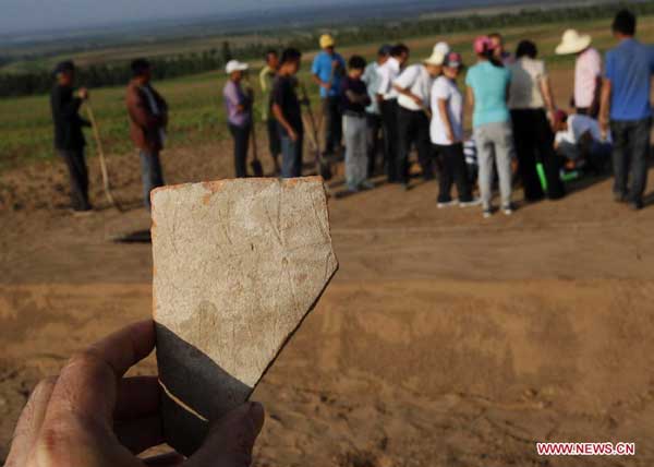 Terracotta portrait discovered in N China's prehistoric site