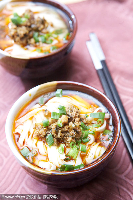 Hangzhou residents enjoy noodles during <EM>Zhongfu</EM>