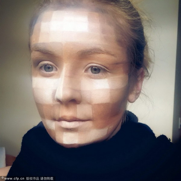 Make-up artist creates special-effects on her face