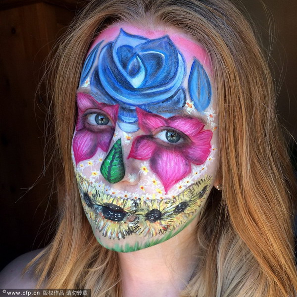 Make-up artist creates special-effects on her face