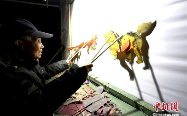 Old craftsman worries about future of shadow puppetry