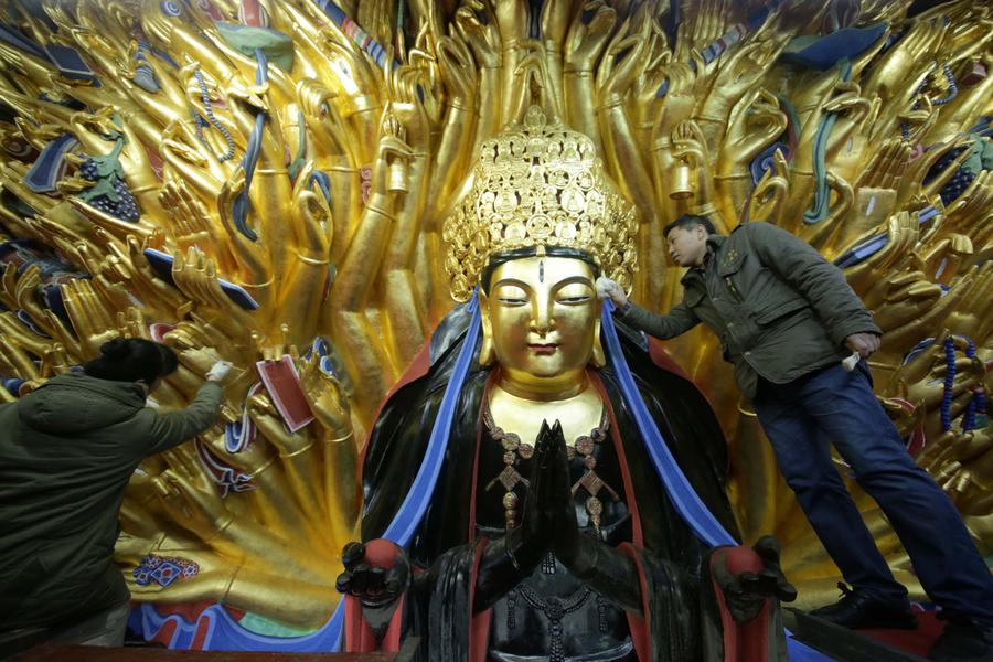 Repair of Dazu Thousand – Hand Kwan-yin statue to finish