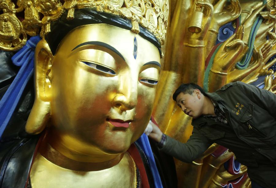 Repair of Dazu Thousand – Hand Kwan-yin statue to finish