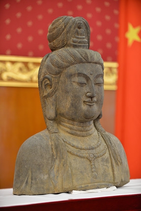 Australia returns ancient statue to China