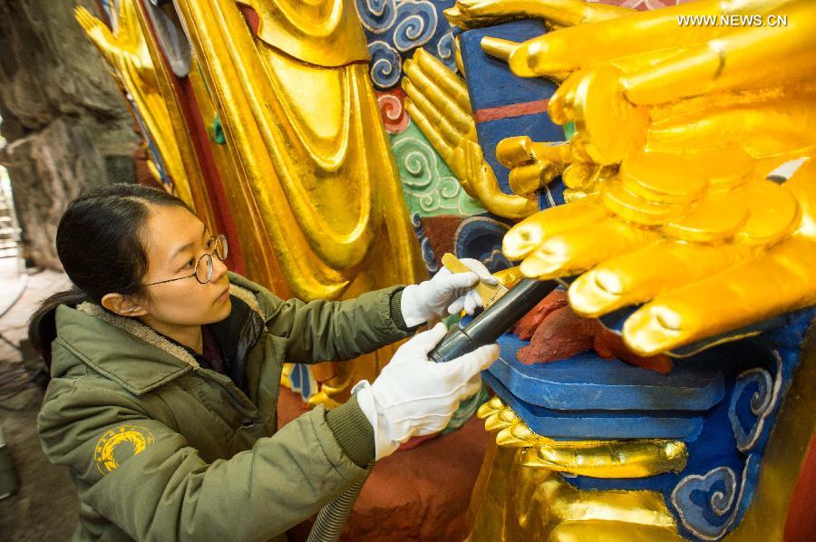 Repair of Thousand-hand Kwan-yin sculpture to finish in China's Chongqing