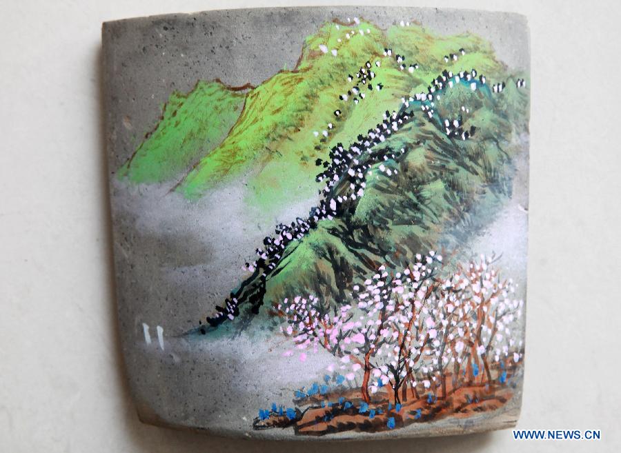 Tile paintings created in Shandong, E China