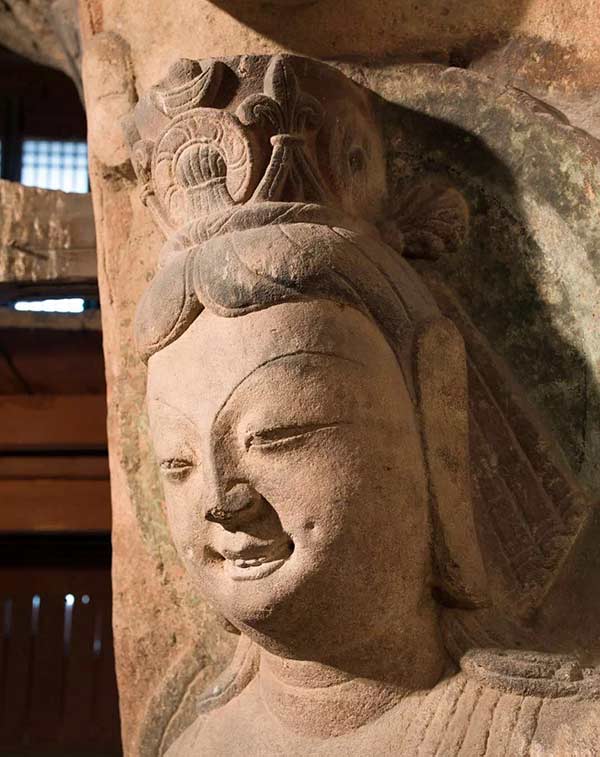 Grinning Bodhisattva statue from Yungang Grottoes amazes visitors