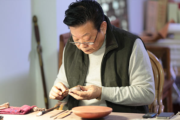 Art show spotlights folk pottery of Jiangsu