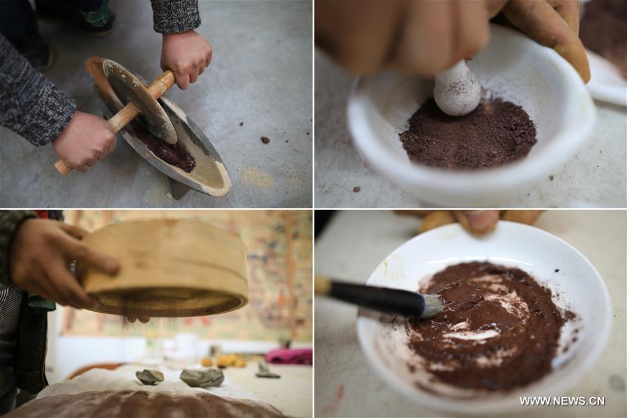 Rock-color paintings created in NW China's Dunhuang