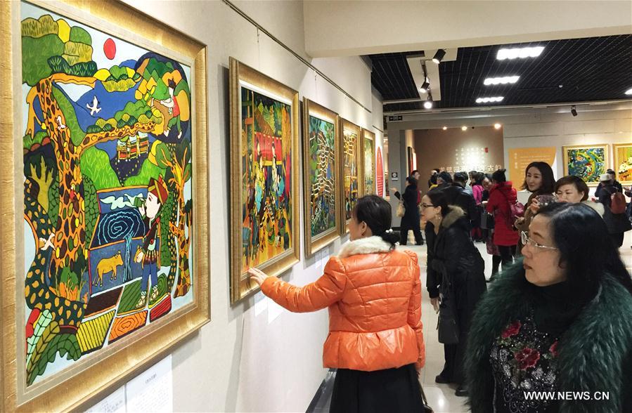 Exhibition on farmer paintings of Dong ethnic group held in S China