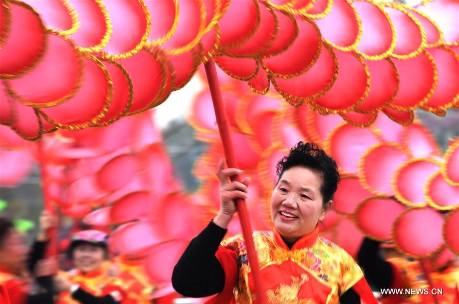 People perform dragon dance in Wuhan