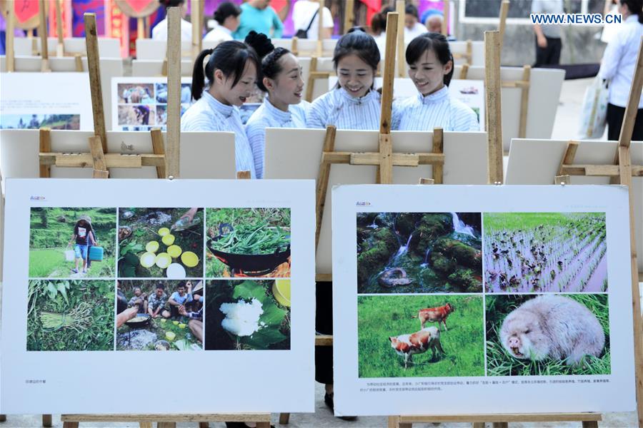 Photo exhibition on customs, life of villagers held in S.W. China