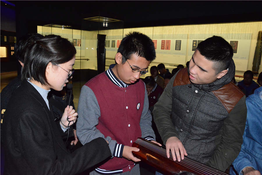 Visually-impaired students touch history with their senses