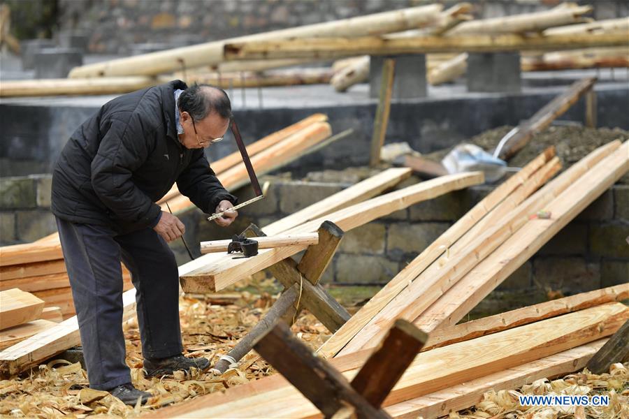 Architect of stilted house of Tujia people