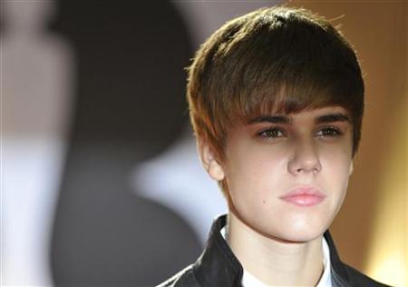 Justin Bieber gets wax figure and cuts hair
