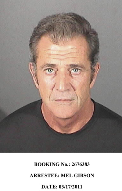Mel Gibson booked by police on battery plea