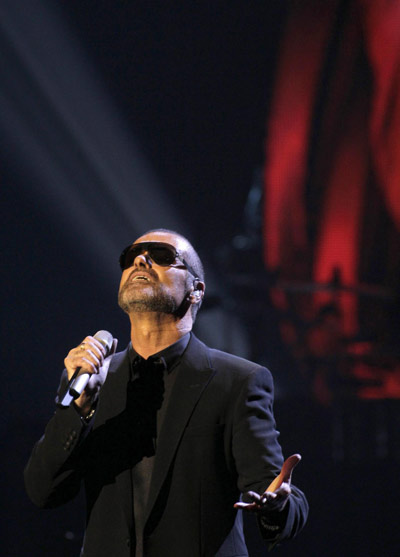 George Michael performs during his concert in Prague