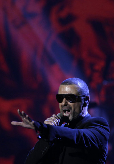 George Michael performs during his concert in Prague