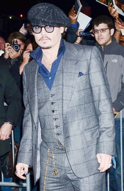 Johnny Depp shoves 'midget down a toilet'