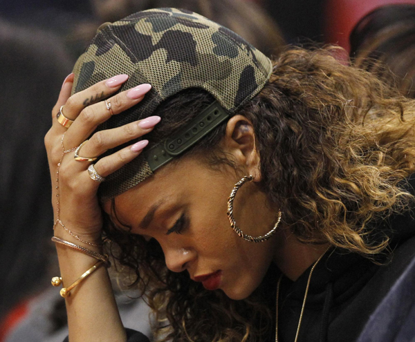 Rihanna enjoys NBA game