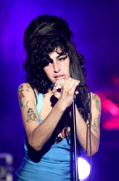 Amy Winehouse's dad feels her presence