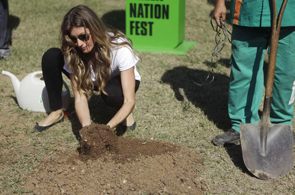 Gisele Bundchen plants trees