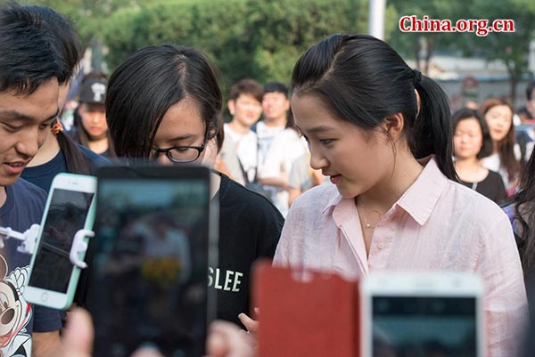 Rising star surrounded by fans after major exam