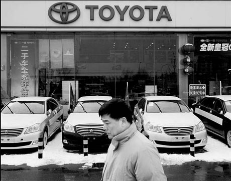 Toyota shares surge on favorable US report